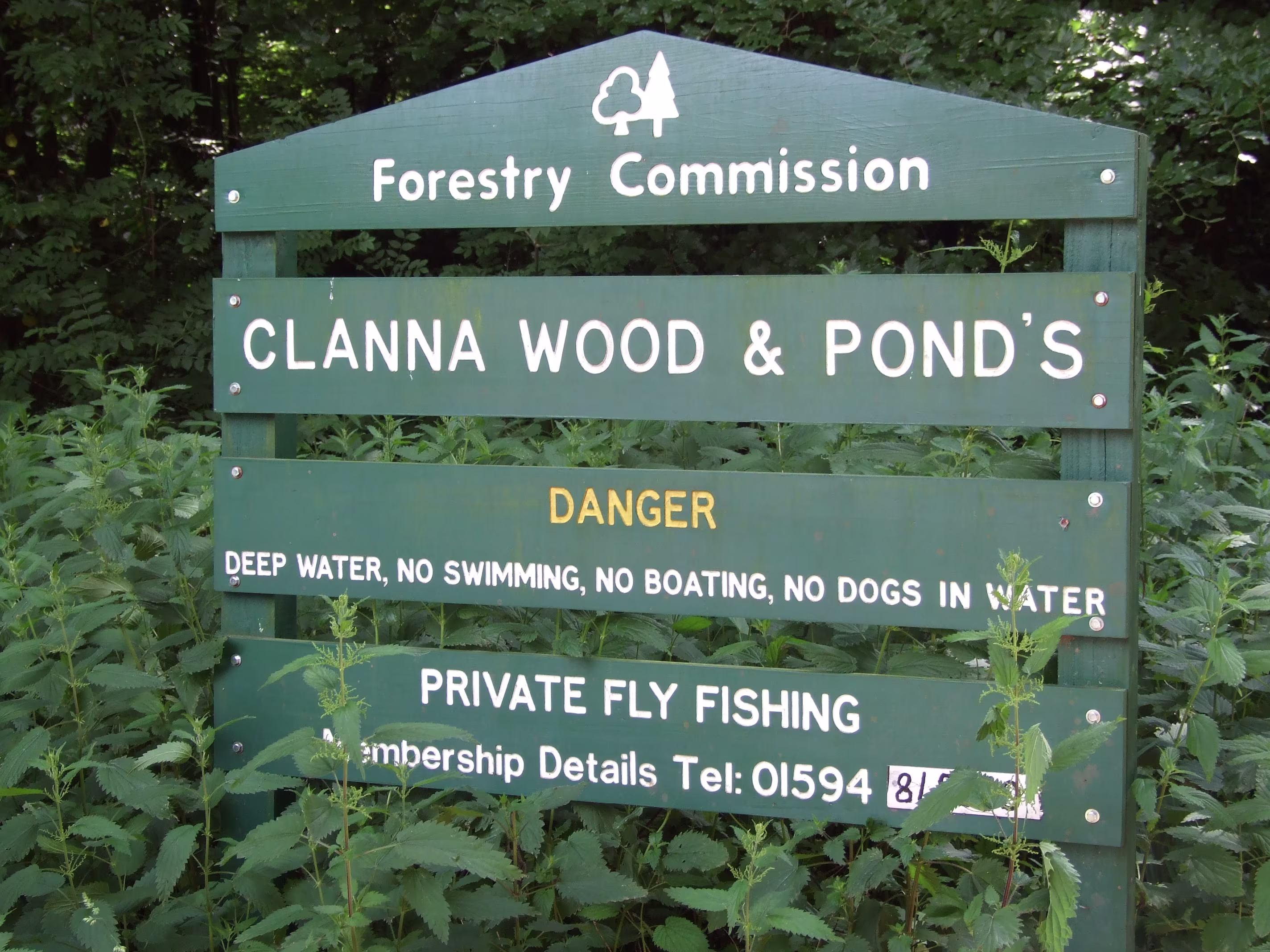 Clana woods and ponds sign image